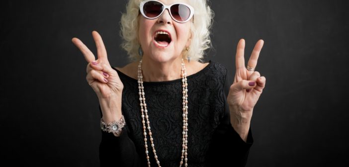 Grandma wearing sunglass with peace sign