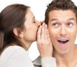 woman whispering to his partner