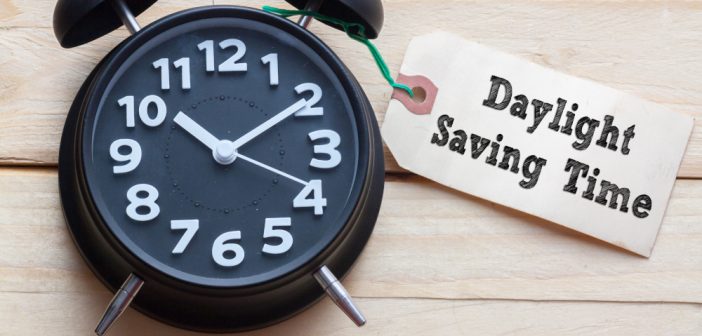 Black Clock with Daylight Saving Time Tag